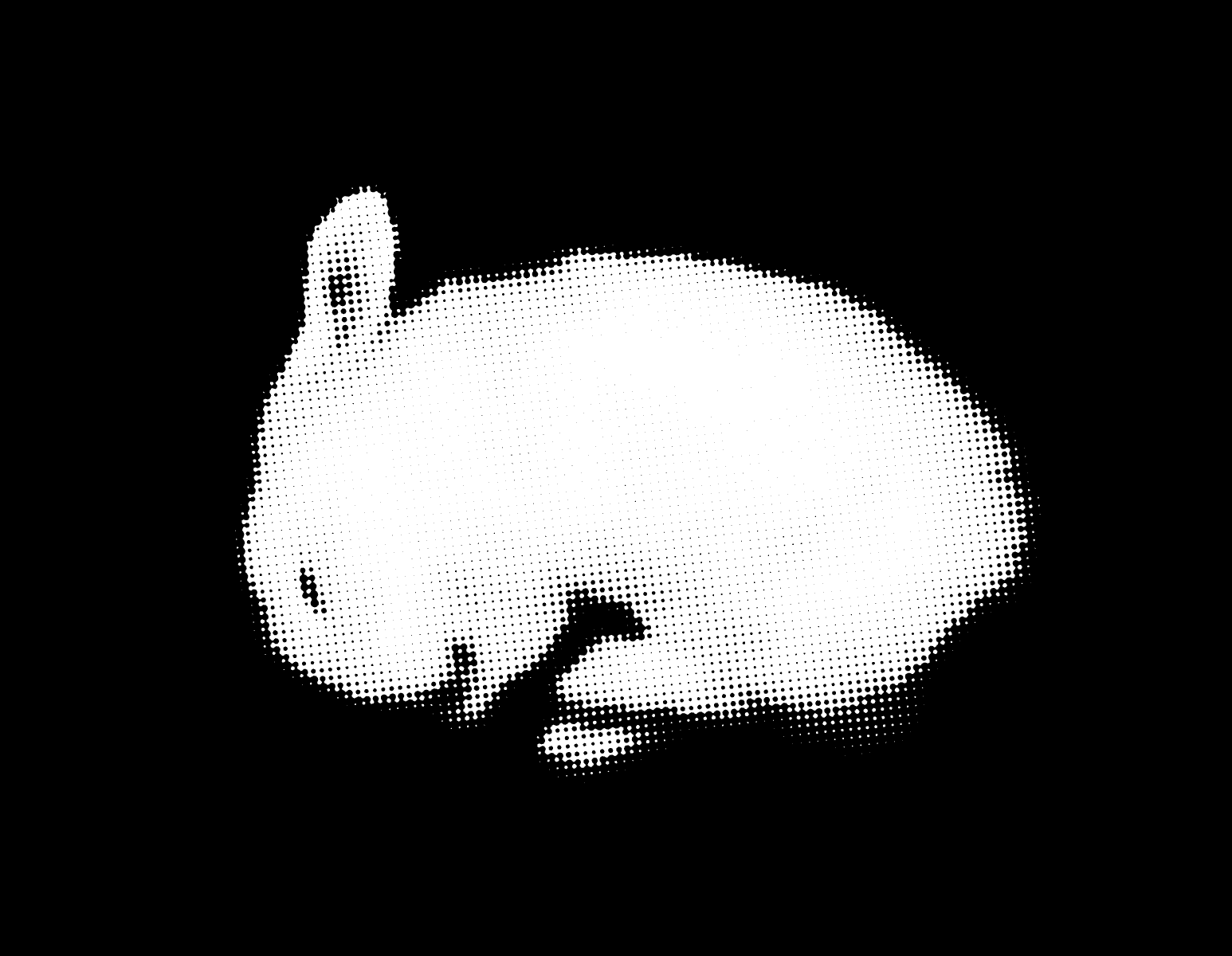 A sleeping white rabbit curled up in a dark burrow